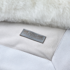 Ivory white alpaca fur rug back