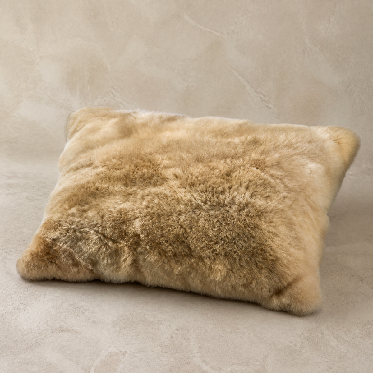 Beige baby alpaca fur throw pillow, front view
