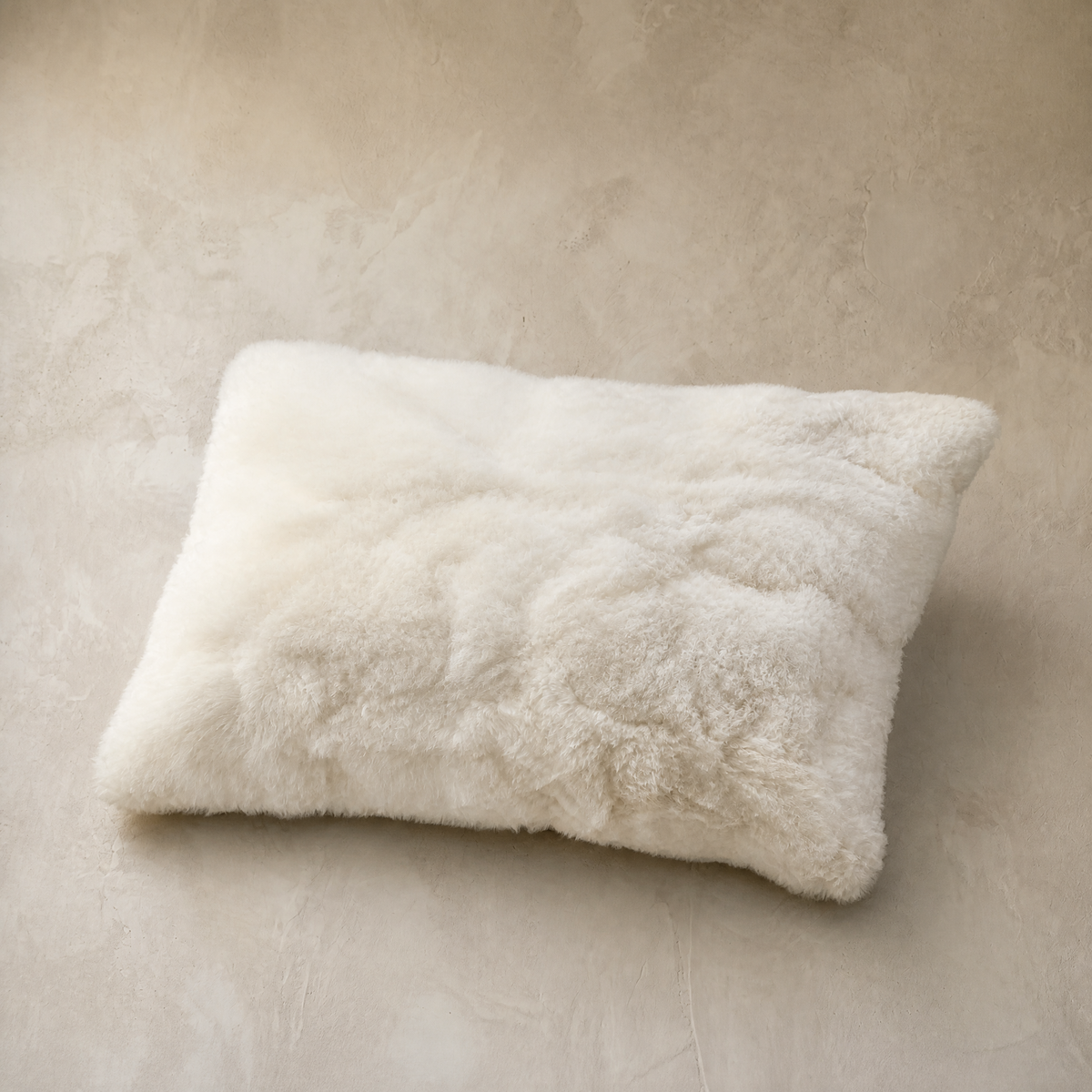 Ivory white baby alpaca fur throw pillow, front view