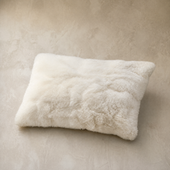 Ivory white baby alpaca fur throw pillow, front view