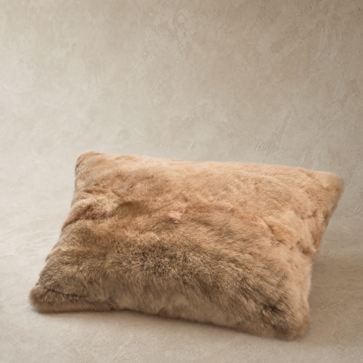 Taupe baby alpaca fur throw pillow, front view