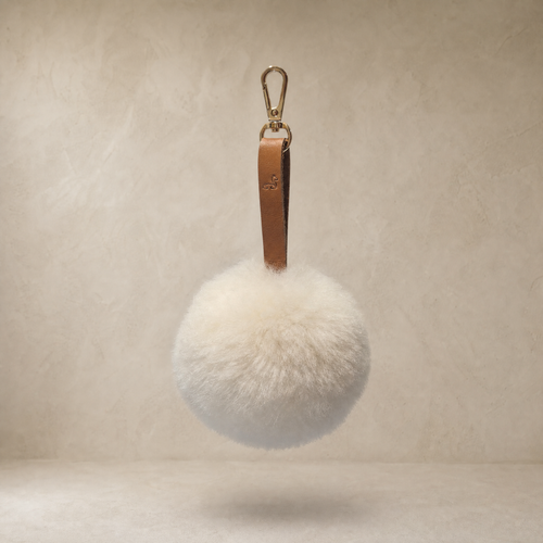 Ivory white soft baby alpaca fur pompon with leather strap and golden lobster clasp