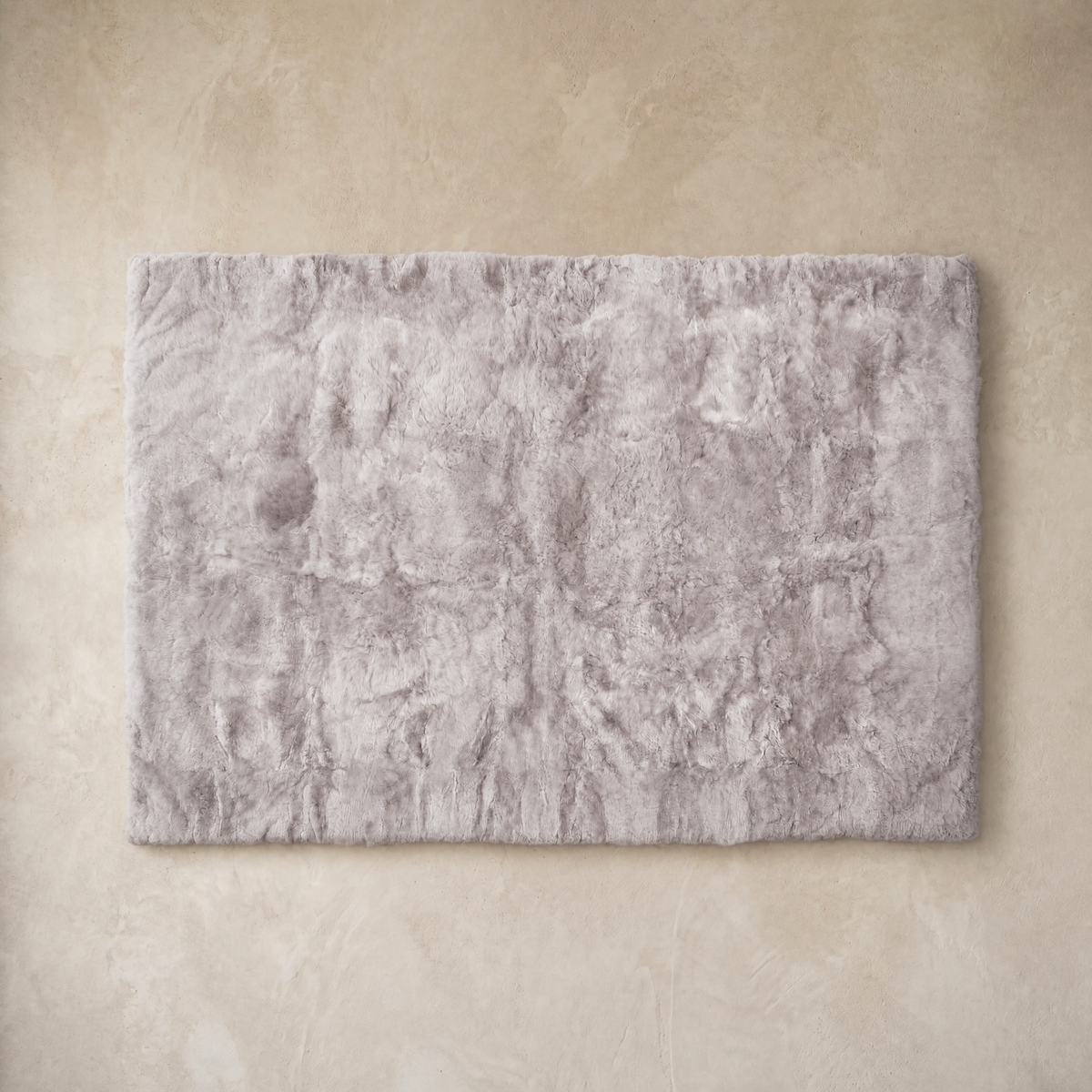Light gray rectangular baby alpaca fur area rug