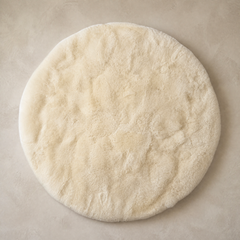 Ivory white round baby alpaca fur area rug