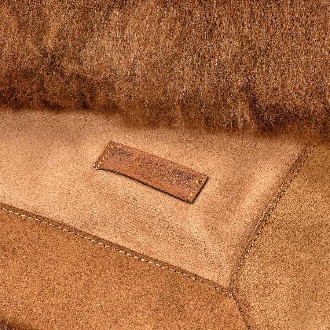 Back of chestnut baby alpaca fur rug with Alpaca Gold Standard label